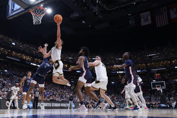 Boilermakers forward Mason Gillis (0) goes to the basket against the Fairleigh Dickinson Knights.